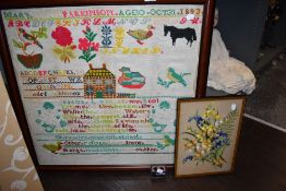 A late Victorian wool work sampler having alphabet, poetry and animals, with a similar needle work