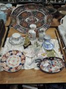 A selection of Chinese and oriental items including Imari dishes, silk scarf and large platter