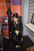 A large figural statue light of Charlie Chaplin in typical Tramp outfit. Having had repair to head