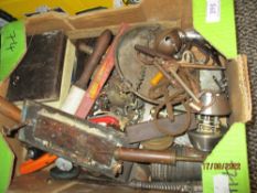 An assortment of vintage hardware and trinkets including large door keys, pen knives and syringe