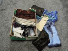 A selection of printed and similar silk napkins and scarfs