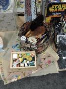 A mixed selection of haberdashery, clothes brushes and needle points.