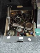 An assorted selection of hardware and trinkets including letter openers, large candle snuffer and