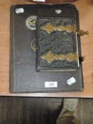 A complete Victorian portrait album with an interesting selection of Players cigarette cards in