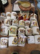 A selection of early 20th century coronation cups and mugs including Foley china