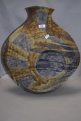 A Julian King Salter large mid century studio pottery vase having indented sides with a fat lava