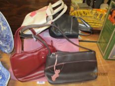 Four modern Radley ladies fashion hand bags in leather