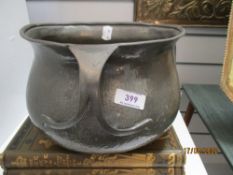 A Victorian Arts and Crafts Tudric Pewter three handle jardinière