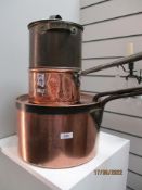 A selection of fine antique copper kitchen and cooking wares including footed tureen, large lidded