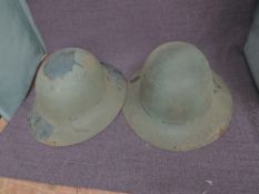 Two WW2 Steel Helmets both having leather liners one marked Merrythought and PSC 141 inside