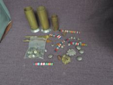 A collection of Trench Art including three shell cases one inscribed 1918 along with two bullet