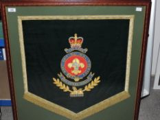 A framed military The Kings' band drape showing 'The Kings' badge 22' x 24'