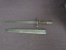 A Swiss model 1899 Bayonet, stamped Maschinenfabrik, Bern, no 77208, with metal scabbard, blade