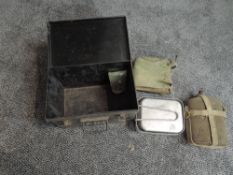 A WW2 ARP Tin containing Water Bottle, two Food Tins, ARP Whistle and a pair of small Gaiters alo