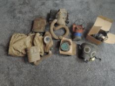 Six WW2 period Gas Masks, one marked 1939 no4A with canvas case, another similar without case, one