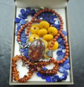 A lapis lazuli carved teardrop bead necklace, Baltic amber bracelet, amber style loose beads and