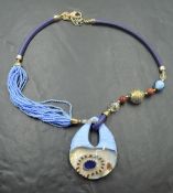 A large Italian designer Murano glass necklace by Antonnio Vaccari in tones of blue with bead,