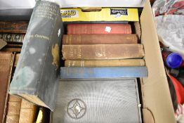 A selection of library volumes including Savage Sudan