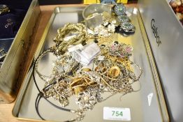 A tray of costume jewellery including necklaces, bangle, crucifix etc