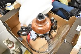A 20th century ceiling mounted light fitting in an oil lamp design