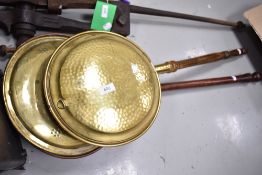 Two brass bed warming pans