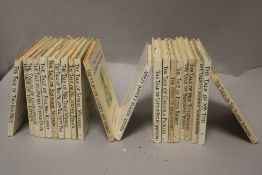 A collection of Beatrix Potter story books including some early editions