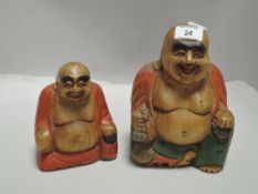 Two 20th century wooden carved Buddha figures by JIG.