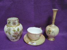 Three pieces of Royal Worcester including tea cup and saucer, scalloped vase with hand painted