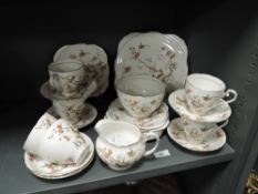 An early 20th century Royal Grafton Birds on Branches pattern tea service