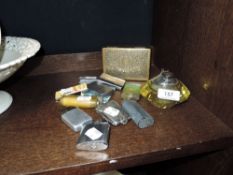 A selection of vintage cigarette lighters including glass table lighter, Ronson and cigar box