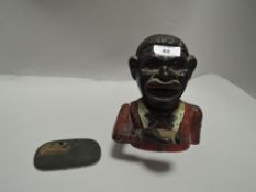 A genuine vintage mechanical cast iron money bank