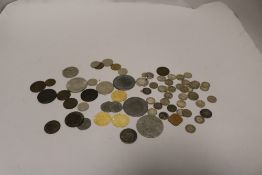A selection of replica early English coins with a selection of silver six pence pieces