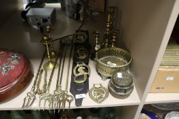 A selection of brass wares including toasting forks, Kirkstall forge nut, and three pairs of