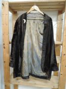 An unusual early 20th century velvet jacket, possibly Oriental, some fade throughout.