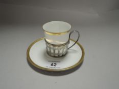 An early 20th century Shelley coffee cup and saucer with a HM silver holder AF