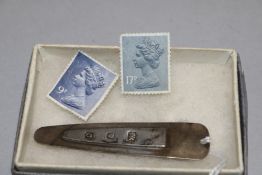 A HM silver book mark of plain form