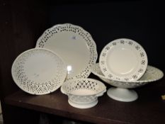 A collection of Leeds ware classical cream ware having simple and effective perforated design,