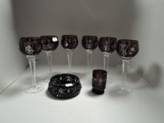 A set of six modern wine glasses having a deep red cameo cut in a Bohemian style with similar cup