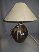 A mid century studio pottery lamp base with drip glaze, and naturalistic matching shade
