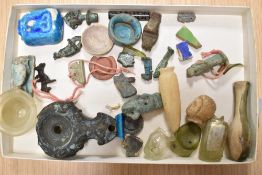 A selection of antique Egyptian artefacts and burial tokens including metal and ceramic figures,