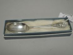 A Scottish silver teaspoon, with pierced thistle design to surmount, marks for Edinburgh 1966, maker