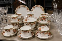 A late Victorian Royal Vale china Longton part tea service with ivy leaf decoration