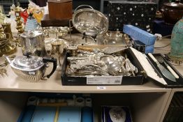 A good selection of fine silver plated table wares including tea pot, sugar castors, water jug and