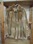 A vintage Hutcheson fur coat in medium length