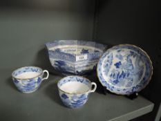 A selection of blue and white ceramics including Chinese tea cups and Arcadian 'Chariots' fruit