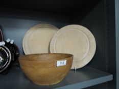 Two vintage wooden bread boards with a wooden hand turned bowl
