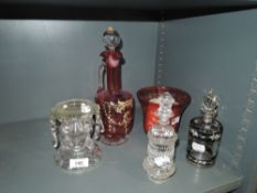 A selection of early 20th century hand decorated glass wares including scent bottles, cranberry