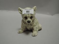 A mid century M Rhodes slip cast figure of a baby polar bear dated 1952