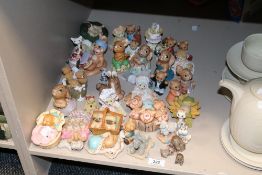 A selection of vintage figures and figurines including Moorcraft and Pendelfin