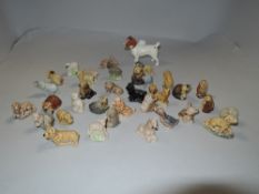 A Beswick study of a Jack Russell with a selection of Wade figures